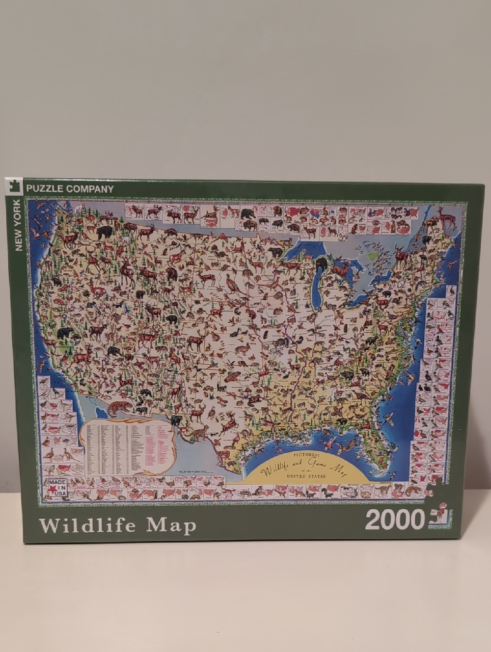 New York Puzzle Company 2000 Piece Wildlife Map Puzzle